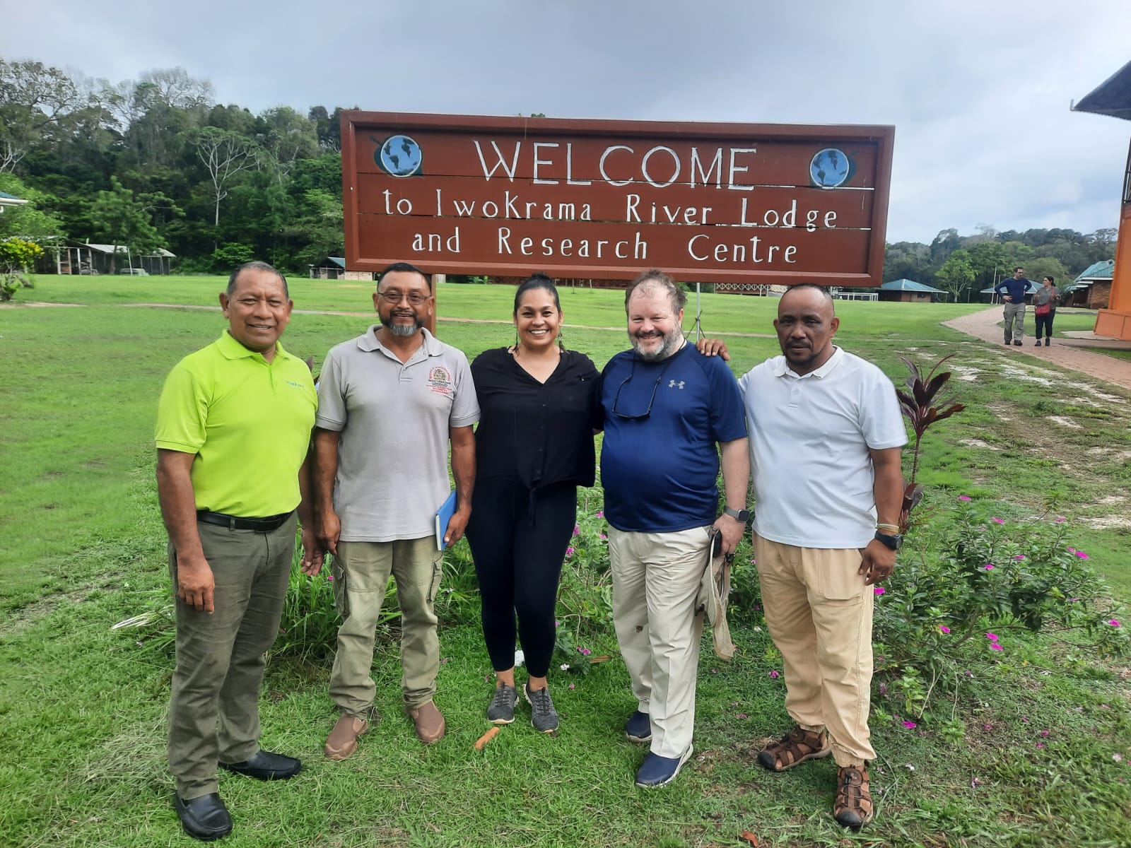 Photograph of Graham Watkins and the team at the Iwokrama Forest Lodge.